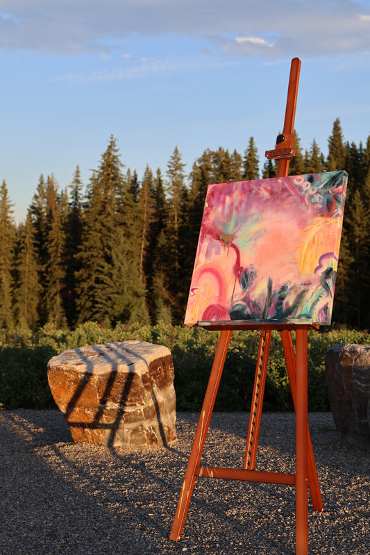 “I Was Enough” – original textured abstract painting by Olia Nychyporenko (artbyOliaN), displayed on an easel in a natural forest setting. Expressive acrylic artwork in coral, lavender, and teal hues.